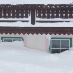 House buried in snow