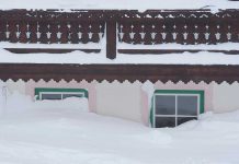 House buried in snow