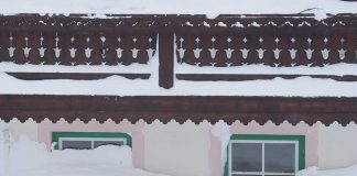 House buried in snow