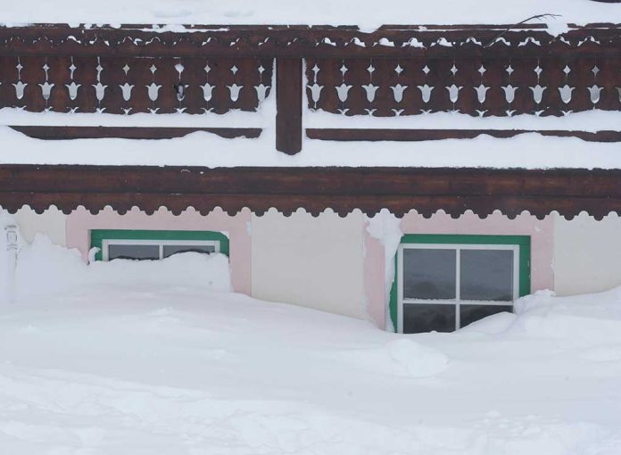 House buried in snow