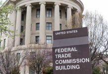 Federal Trade Commission Building with sign and trees