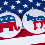 Republican and Democrat symbols on American flag