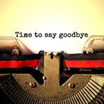 Typewriter with "Time to say goodbye" text.