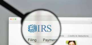 Magnifying glass over IRS website page