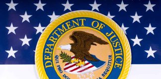 Department of Justice seal on American flag background.