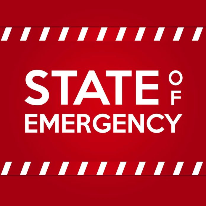 "STATE OF EMERGENCY" in bold white text on red background.