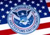 US Immigration and Customs Enforcement emblem on flag