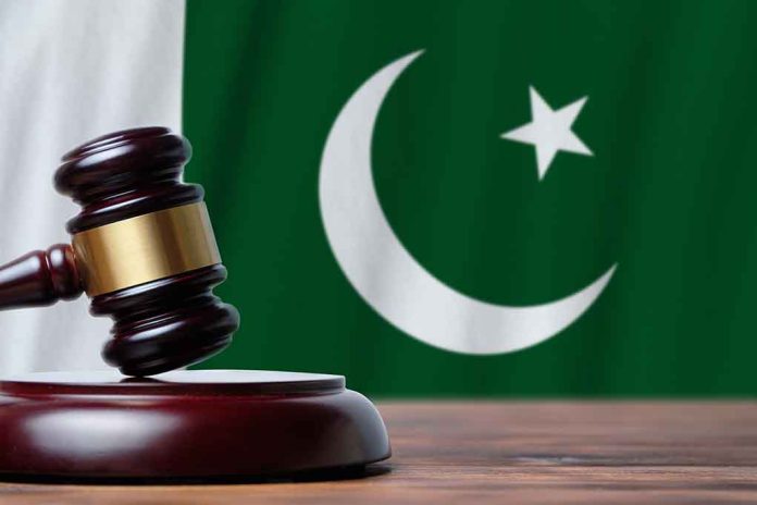 1790503265 featured image Gavel with Pakistan flag in the background.