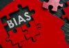 Red brain puzzle with the word bias inside
