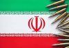 Iranian flag with bullets on top corner