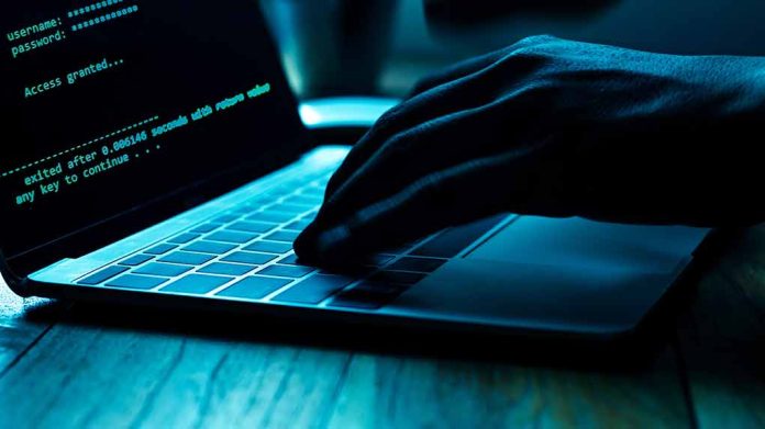 1166453734 featured image Hand typing on laptop with code on screen