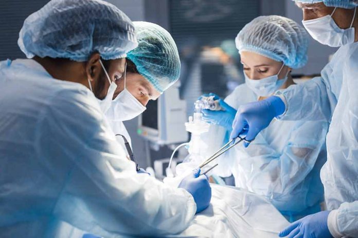 1265400856 featured image Doctors performing surgery in an operating room
