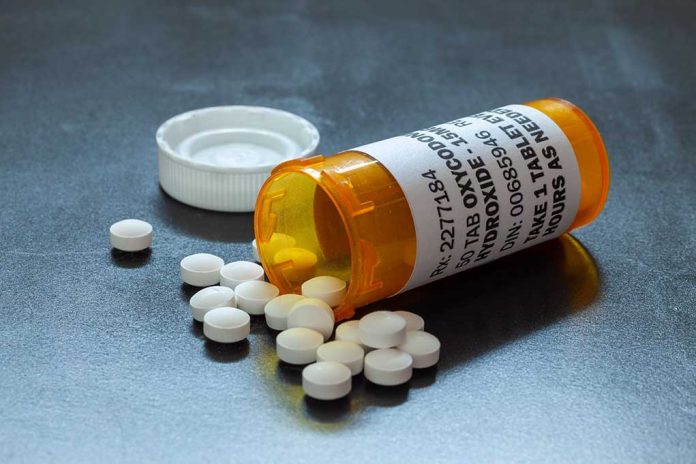 1478645945 featured image Open pill bottle with white tablets spilled out