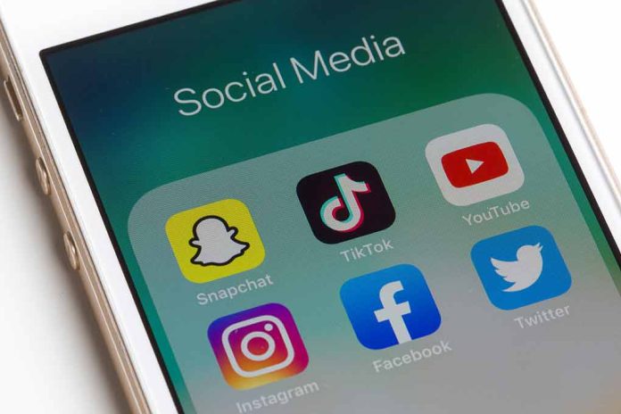 1551279269 featured image Phone showing social media app icons Snapchat TikTok YouTube
