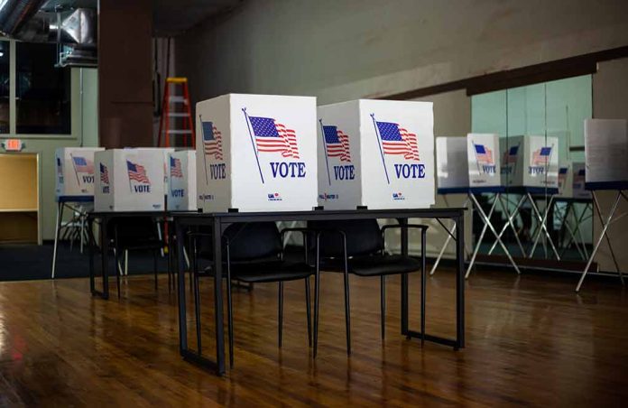 1837302946 featured image Voting booths with American flag and vote sign