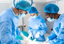 Surgeons performing an operation in a sterile environment