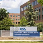 FDA building exterior with tree and blue sky