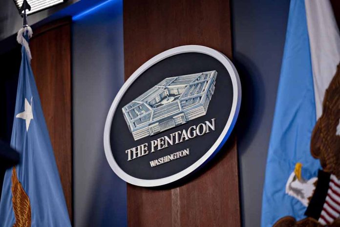 2265798341 featured image The Pentagon emblem between two flags