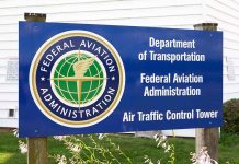 Federal Aviation Administration sign outside white building