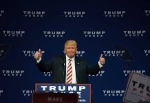 Man giving thumbs up at Trump Pence rally