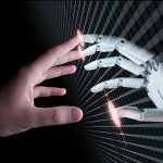 Human and robotic hand reaching out to touch