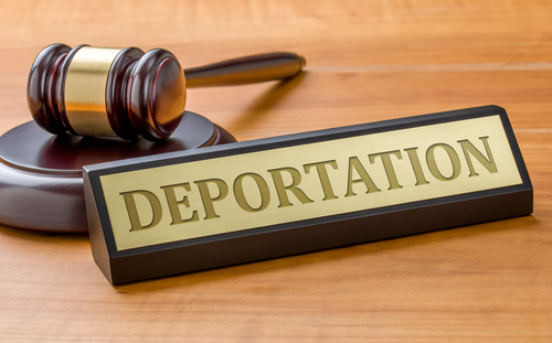 deportation_575161729 featured image Gavel beside deportation sign on wooden table