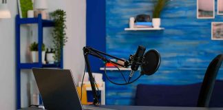 Laptop and a microphone on a desk