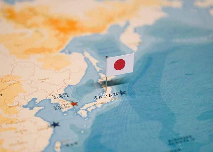 2327414549 featured image Map of Japan with flag pin placed nearby