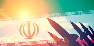 Iran flag with missile silhouettes and sunlight