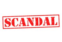 Red stamp with the word scandal