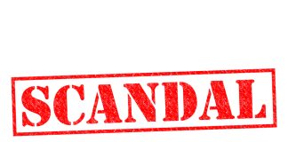 Red stamp with the word scandal