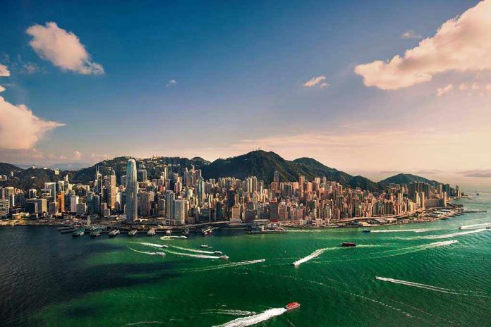 1011338440 Aerial view of a coastal city with skyscrapers
