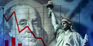 Declining graph Benjamin Franklin and Statue of Liberty background