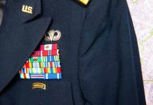 Military jacket with ribbons and badges displayed