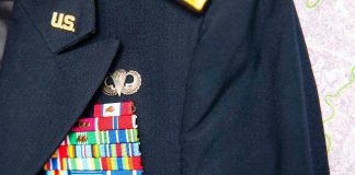 Military jacket with ribbons and badges displayed