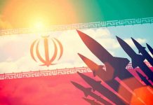 Silhouettes of missiles over Iran's flag graphic