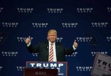 Man giving thumbs up at Trump Pence rally