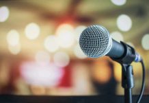 Microphone with blurred lights in the background