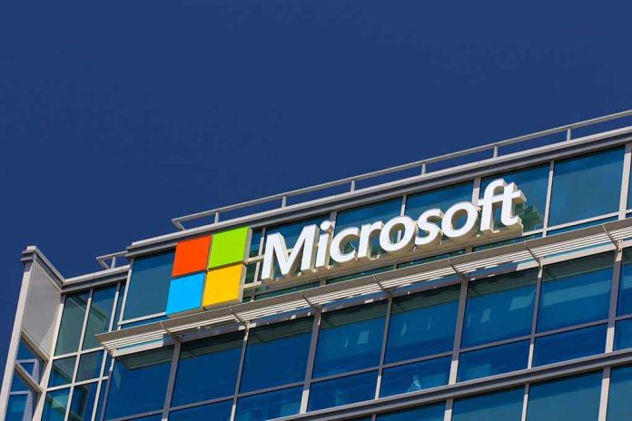 Microsoft logo on a modern corporate building against a blue sky