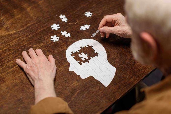 Elderly person completing head shaped jigsaw puzzle