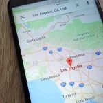 Smartphone displaying map of Los Angeles, California.