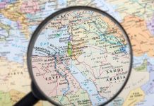 Magnifying glass over the Middle East and Egypt