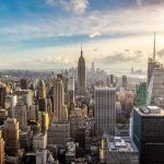 Radical Rent Freeze: NYC Dream or Nightmare? New York City skyline with Empire State Building.