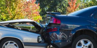 Two cars involved in a rear end collision on a city street