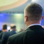 Deadly Church Attack Shatters State’s Openness Man with earpiece at a crowded event