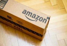 30,000 Jobs GONE: Amazon’s Drastic Move Amazon package on wooden floor