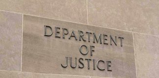 Department of Justice sign on a building