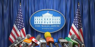 Multiple microphones at White House press briefing podium