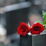 Mayor GUNNED DOWN During Sacred Festival Two red roses on a gravestone