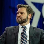 South Park’s VILE Trump Attack Shocks America Man in a suit with a thoughtful expression.